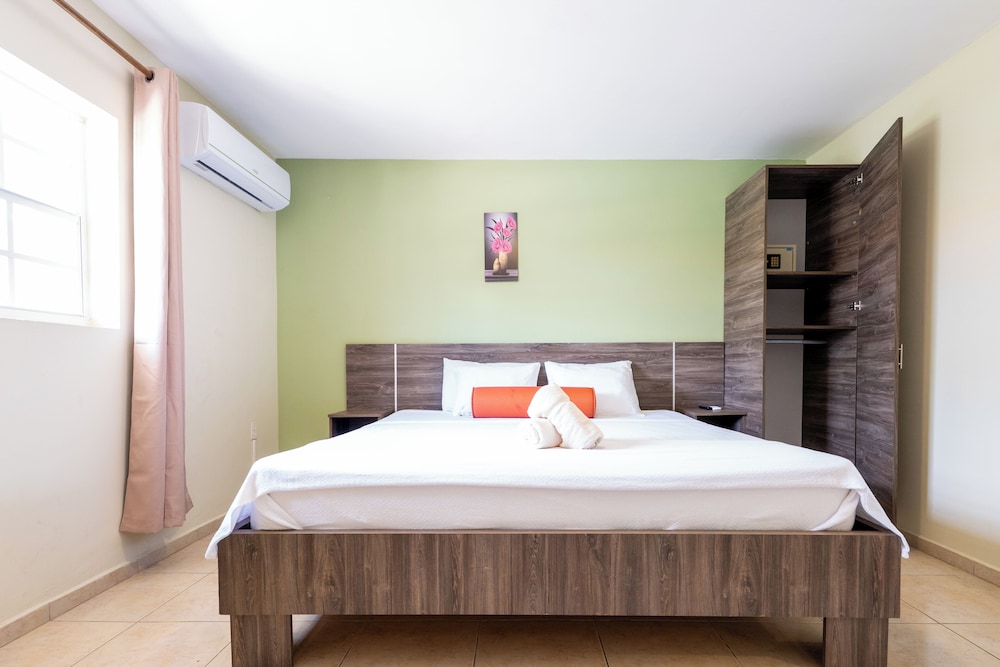 شقة كومفورت بسرير كينج وسرير كوين بإطلالة على المسبح بغرفتي نوم، Delynne Boutique Hotel 6/10