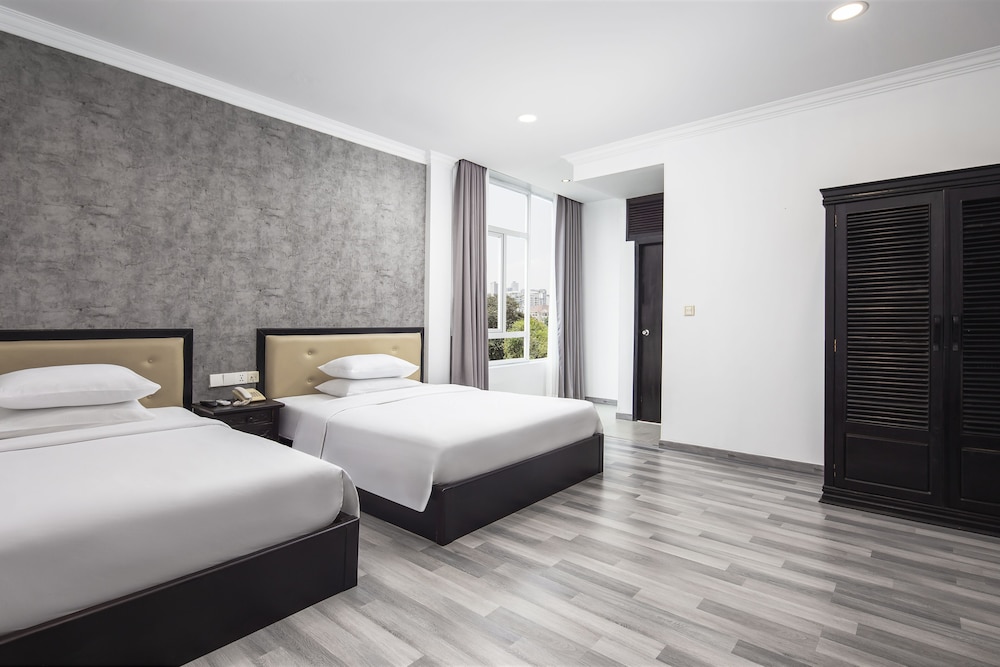 غرفة أساسية ثلاثية بسريرين كوين، KING GRAND BOUTIQUE HOTEL 5/9