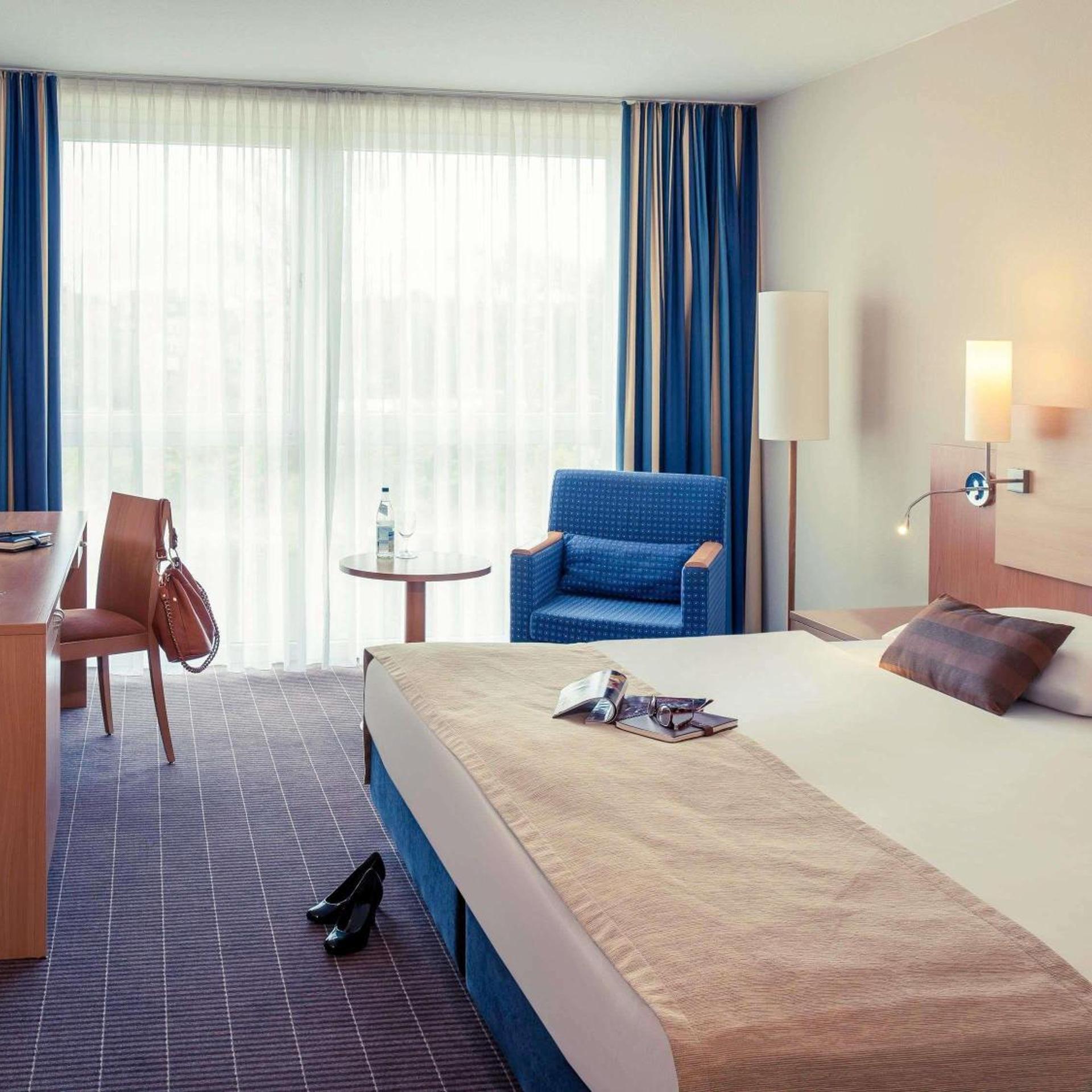 غرفة بسرير كينج بإطلالة على الحديقة، Mercure Hotel Schweinfurt Maininsel 5/7