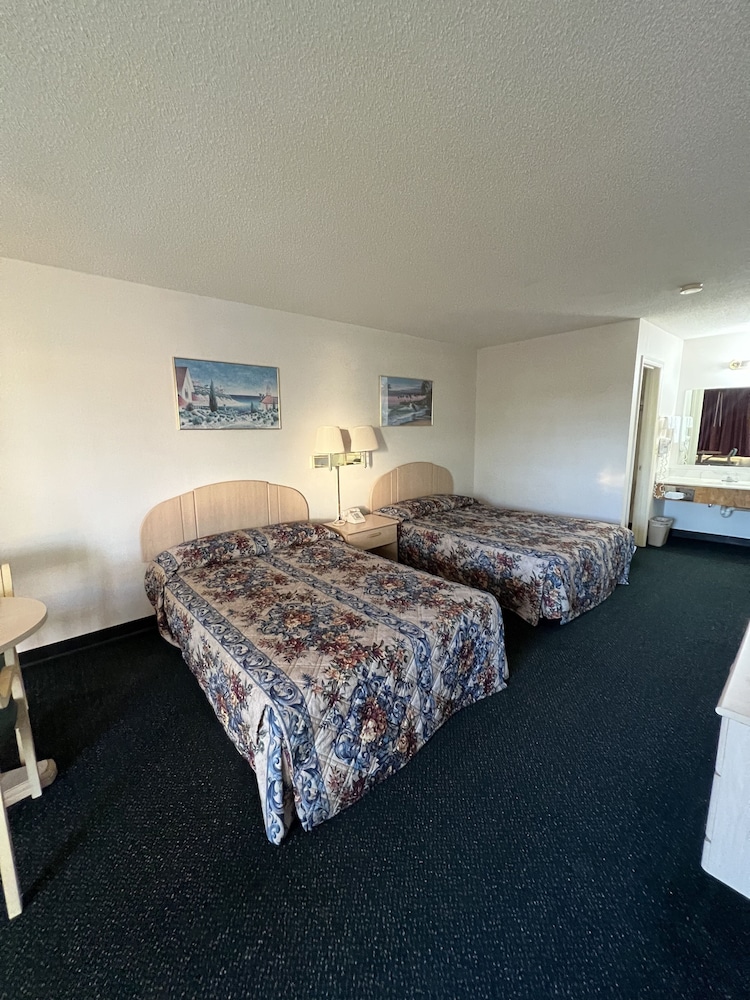 Garden Inn & Suites 12/53