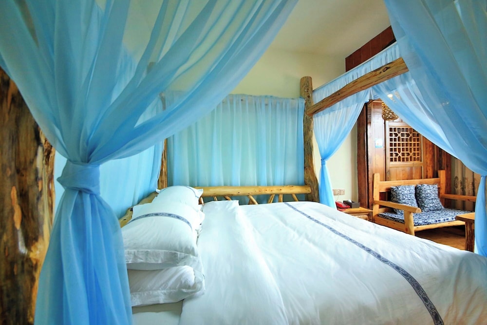 غرفة رومانسية بسرير كوين بإطلالة على الجبل، Xiangxi Dreamweaver Inn 2/6