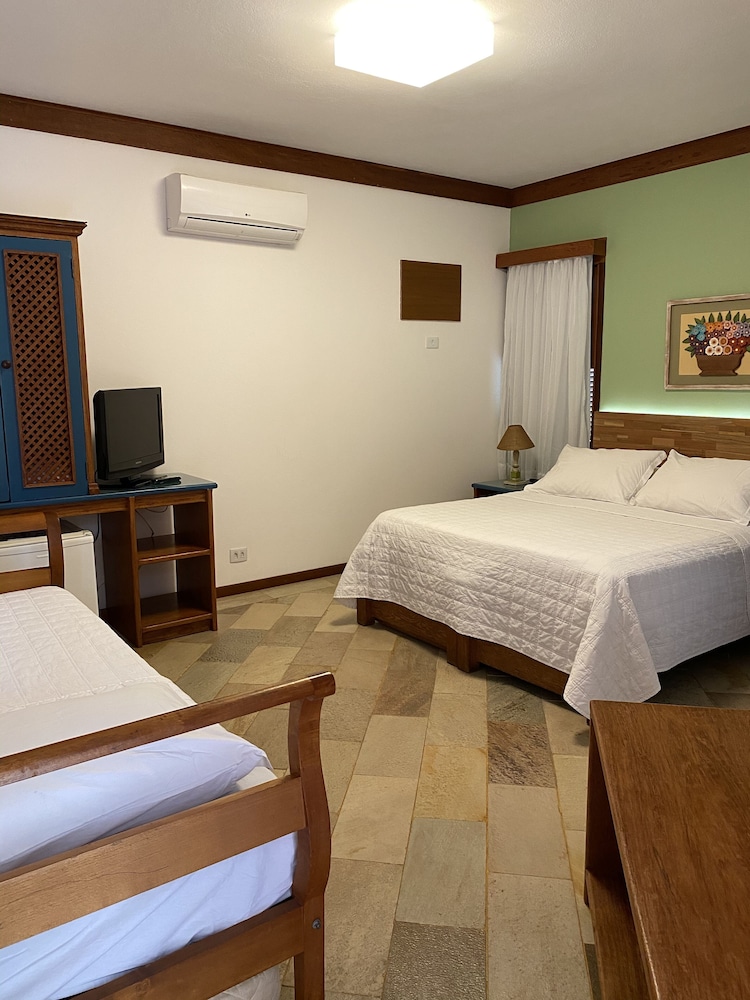 DELUXE, TRIPLE, 1 DOUBLE AND 1 SINGLE BED