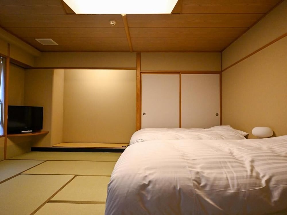 غرفة سوبيريور رباعية بسريرين مزدوجين، Hotel Goryukan 3/9