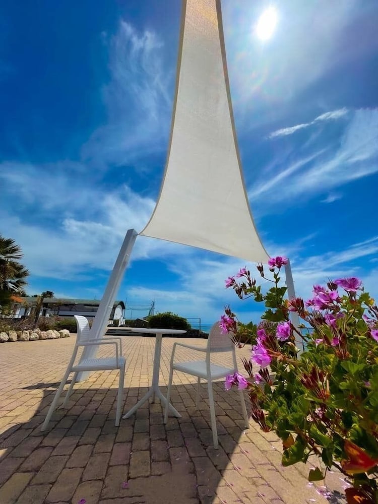 Le Mandrelle Beach Resort 18/28