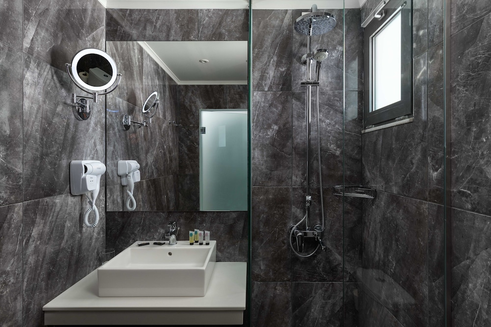 Deluxe, Double Bed, Lateral Pool or Side Sea View، Atalanti Boutique Hotel - Adults Only 5/5
