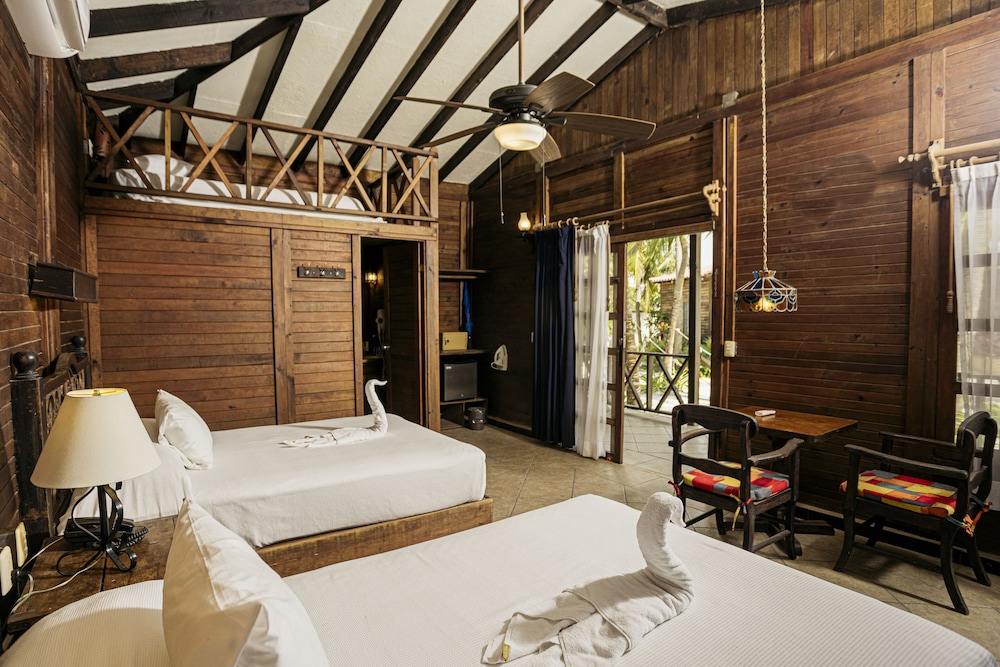 Palm, Beach, Bungalow, 2 Double Beds, 3 Double Beds، Petit Lafitte Hotel 3/9