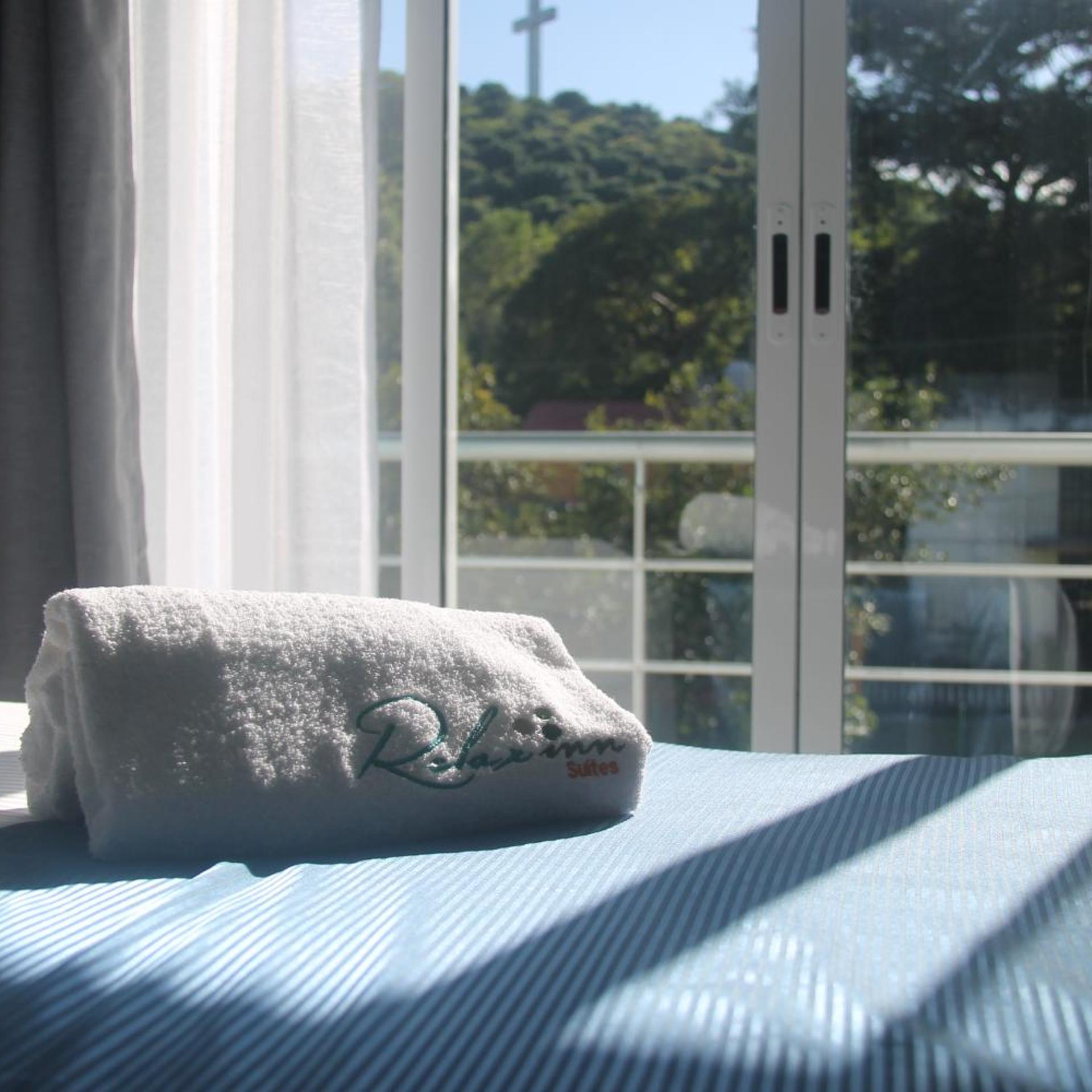 Relax Inn Suites 16/50