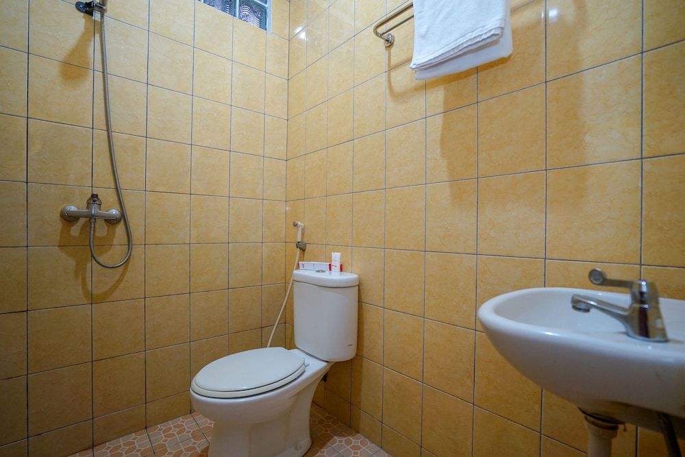 Super OYO 1844 Bravo Residence 38/39