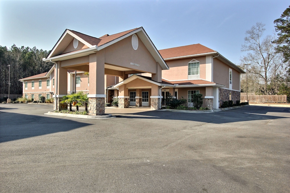 Magnolia Inn Suites 1/50
