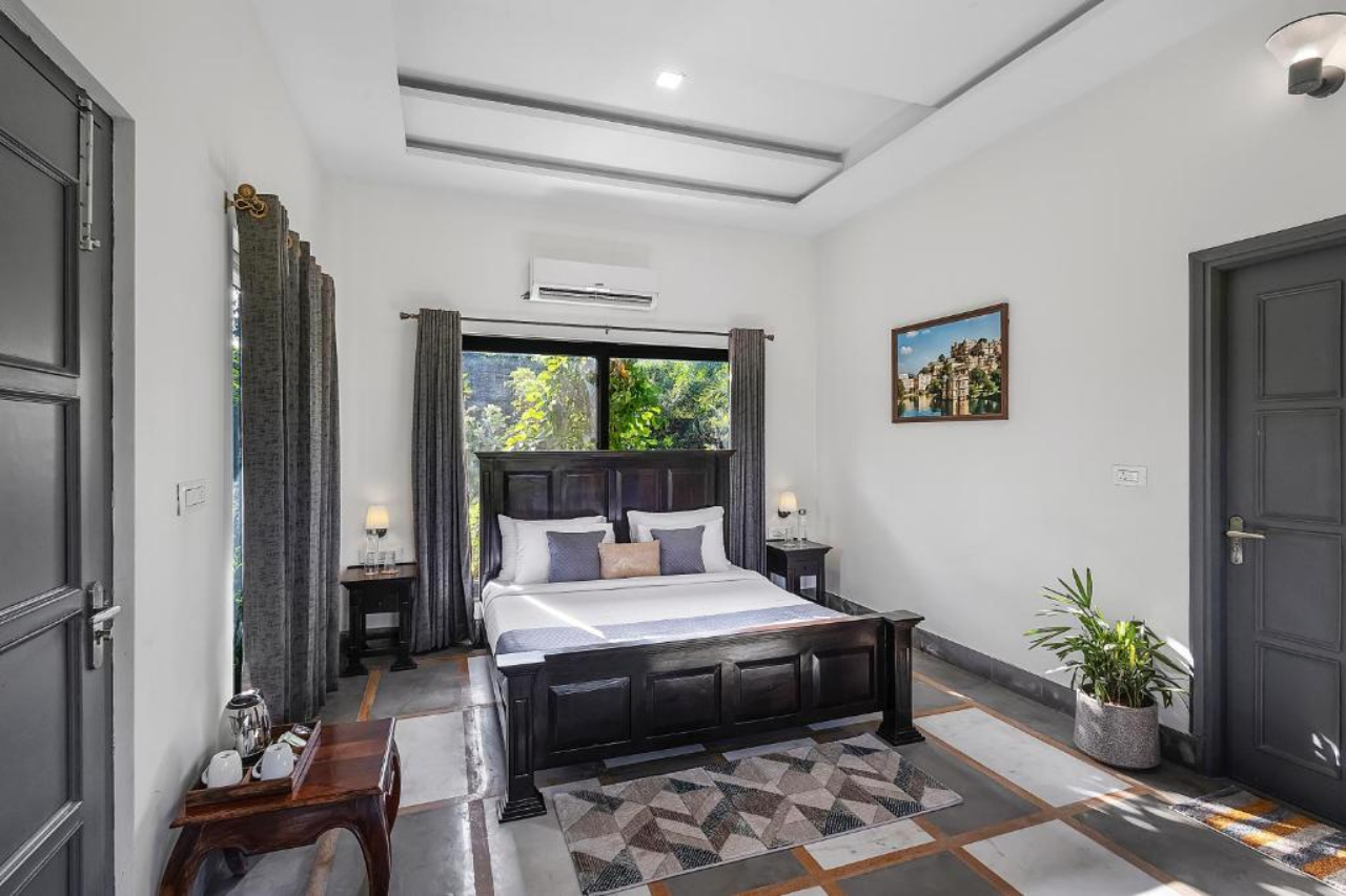 Room at ELIVAAS Raas Stays 4 BHK Retreat with Pvt Pool & Scenic Aravali Views, Mavli