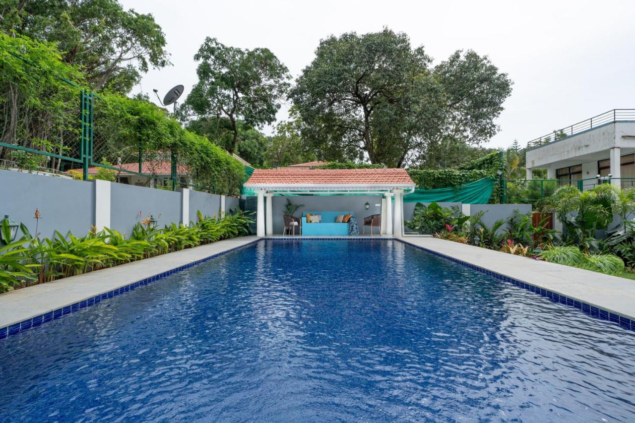 ELIVAAS BluDoor 5BHK Villa, Assagao 61/65