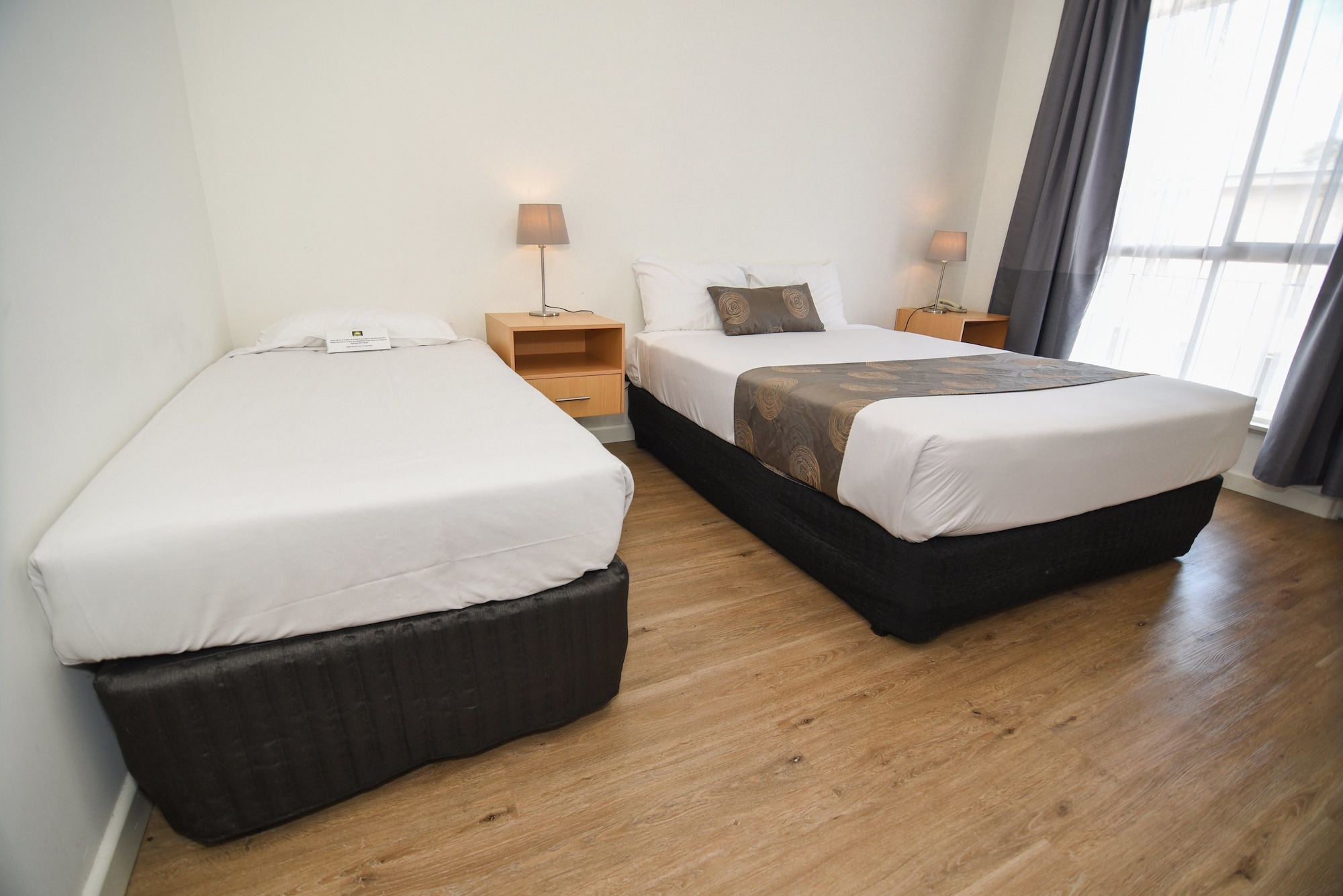 Deluxe, 1 Queen and 1 Single Bed
