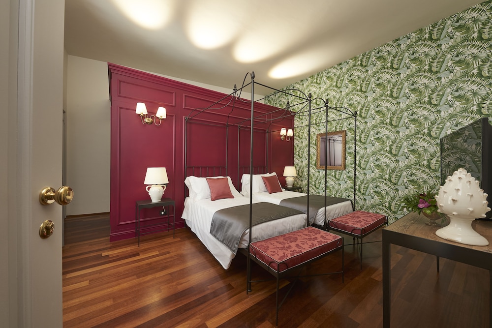 غرفة ديلوكس بسرير كوين، Peruzzi Urban Residences 5/9