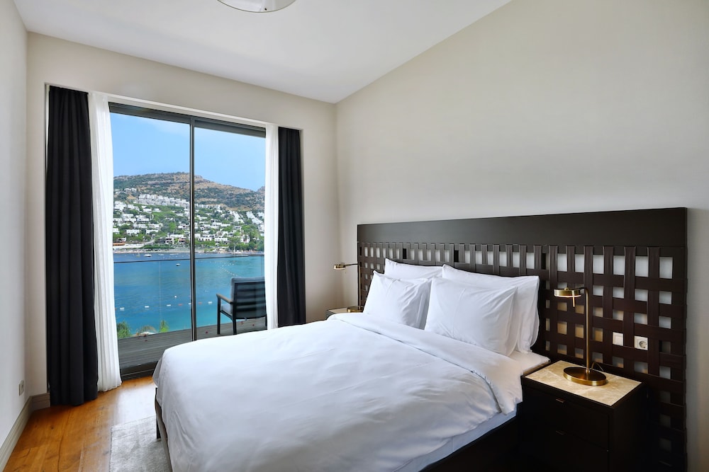 جناح ديلوكس بسرير كوين بإطلالة على البحر، Mare Deluxe Residences and Villas 7/10