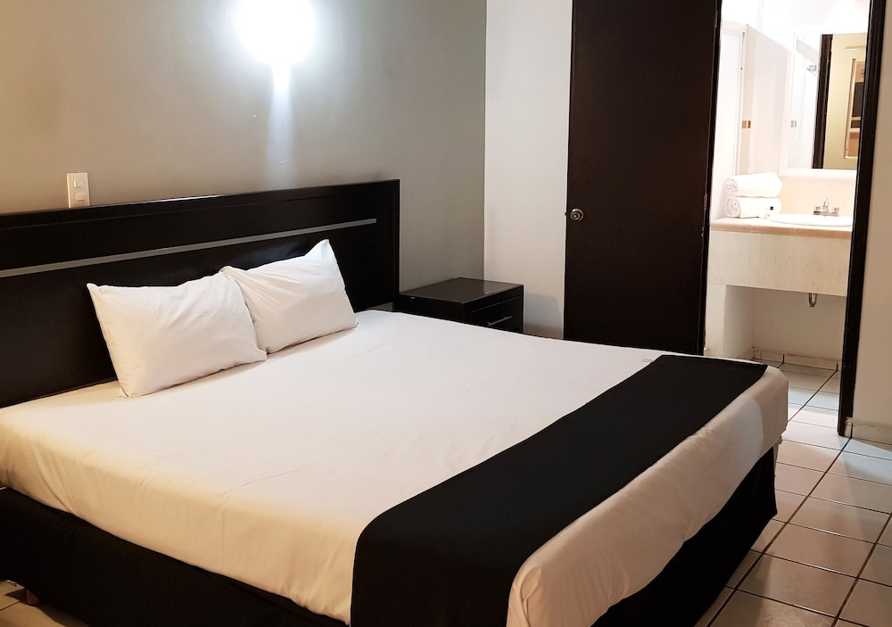 Capital O Hotel Victoria Morelia 19/55
