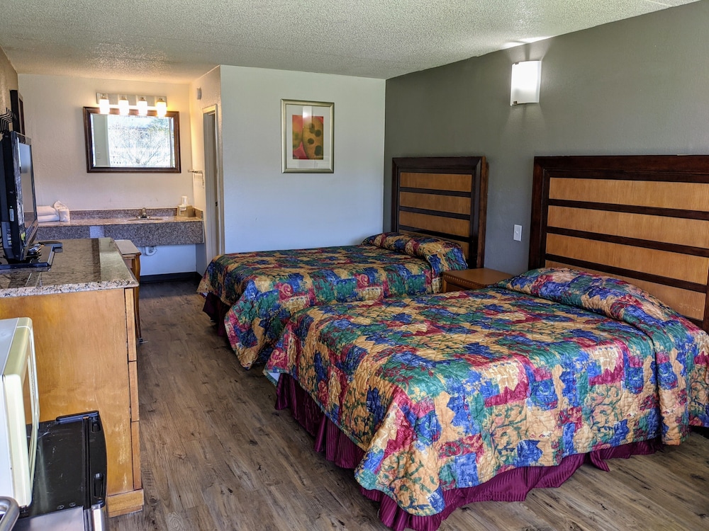 Garden Inn & Suites 14/28