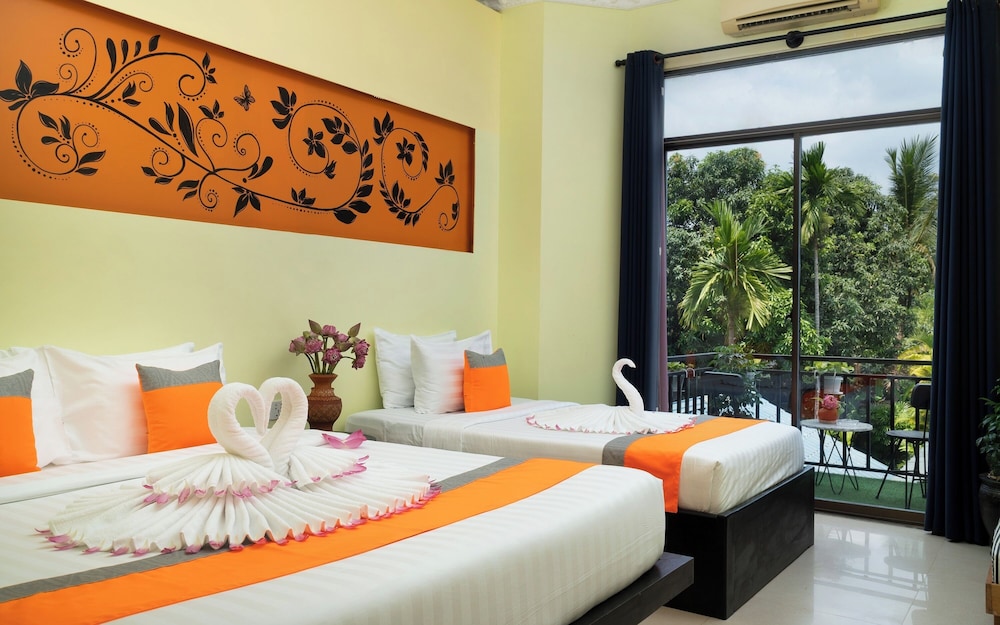 غرفة ديلوكس عائلية بسرير كينج وسرير فردي بشرفة، Central Indochine D Angkor Hotel 8/10