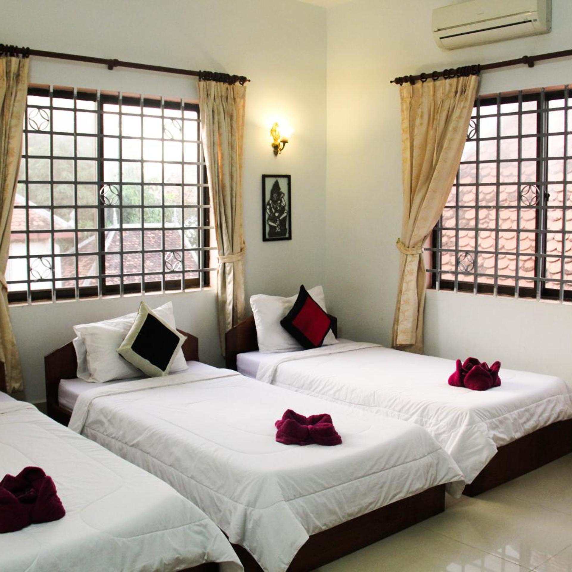 Room, Triple, with Fan, Tropical Breeze Guesthouse 5/8