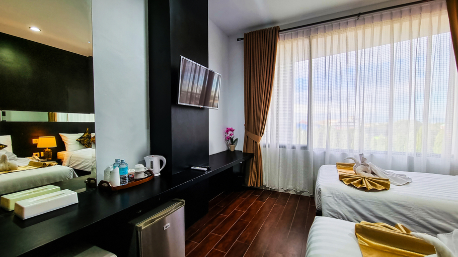 غرفة غراند ديلوكس بسريرين منفصلين، Hotel Rasamala 2/4
