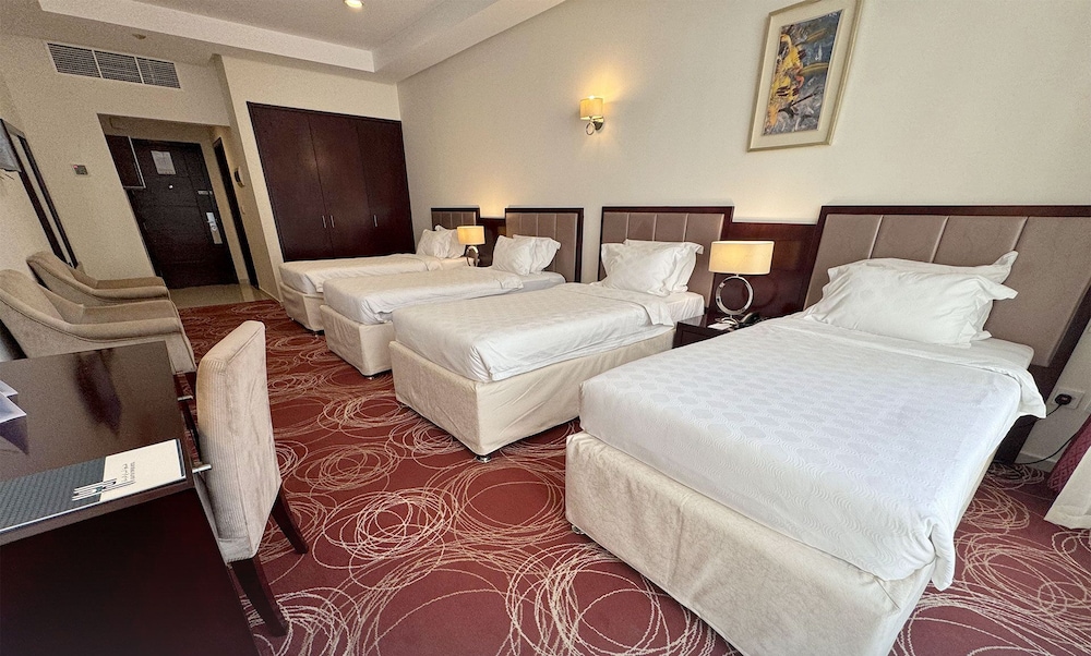 غرفة قياسية رباعية بأربعة أسرّة، ابراج الريان المكية(Al Rayyan Makiya Towers Hotel) 4/9