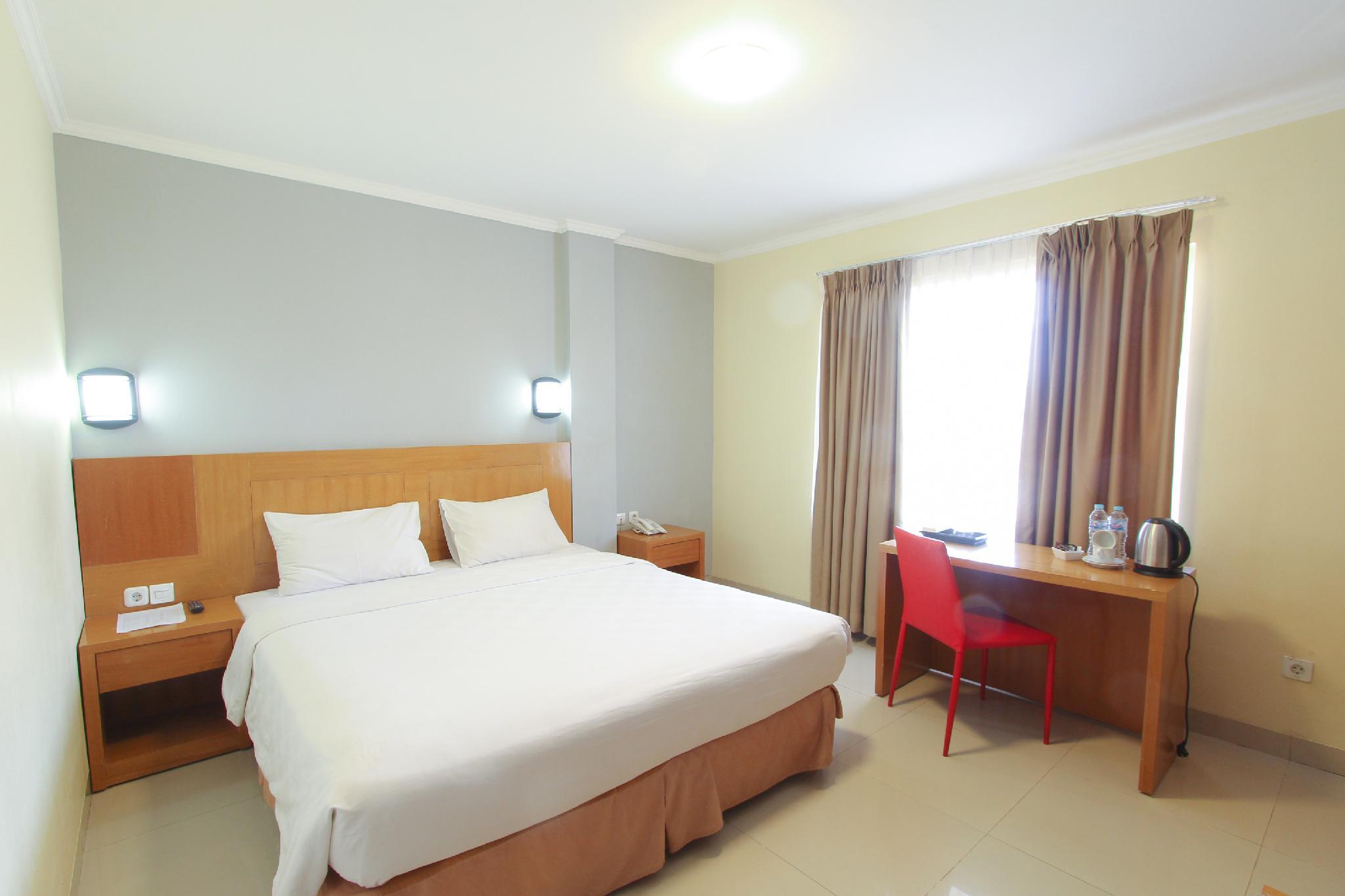 غرفة ديلوكس بسرير مزدوج، Maleosan Inn manado 2/2