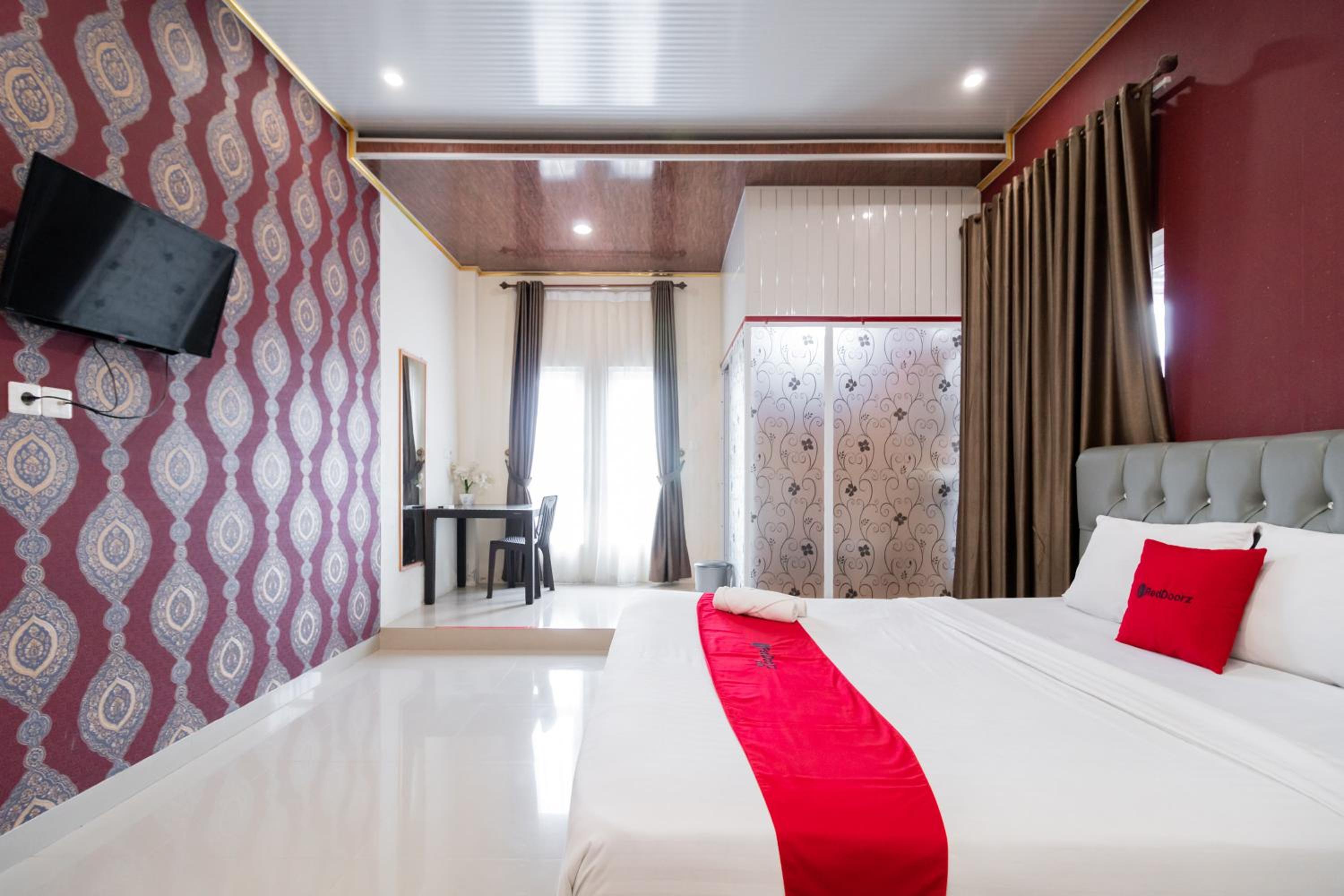 OYO 1648 Penginapan Three Joye 14/47