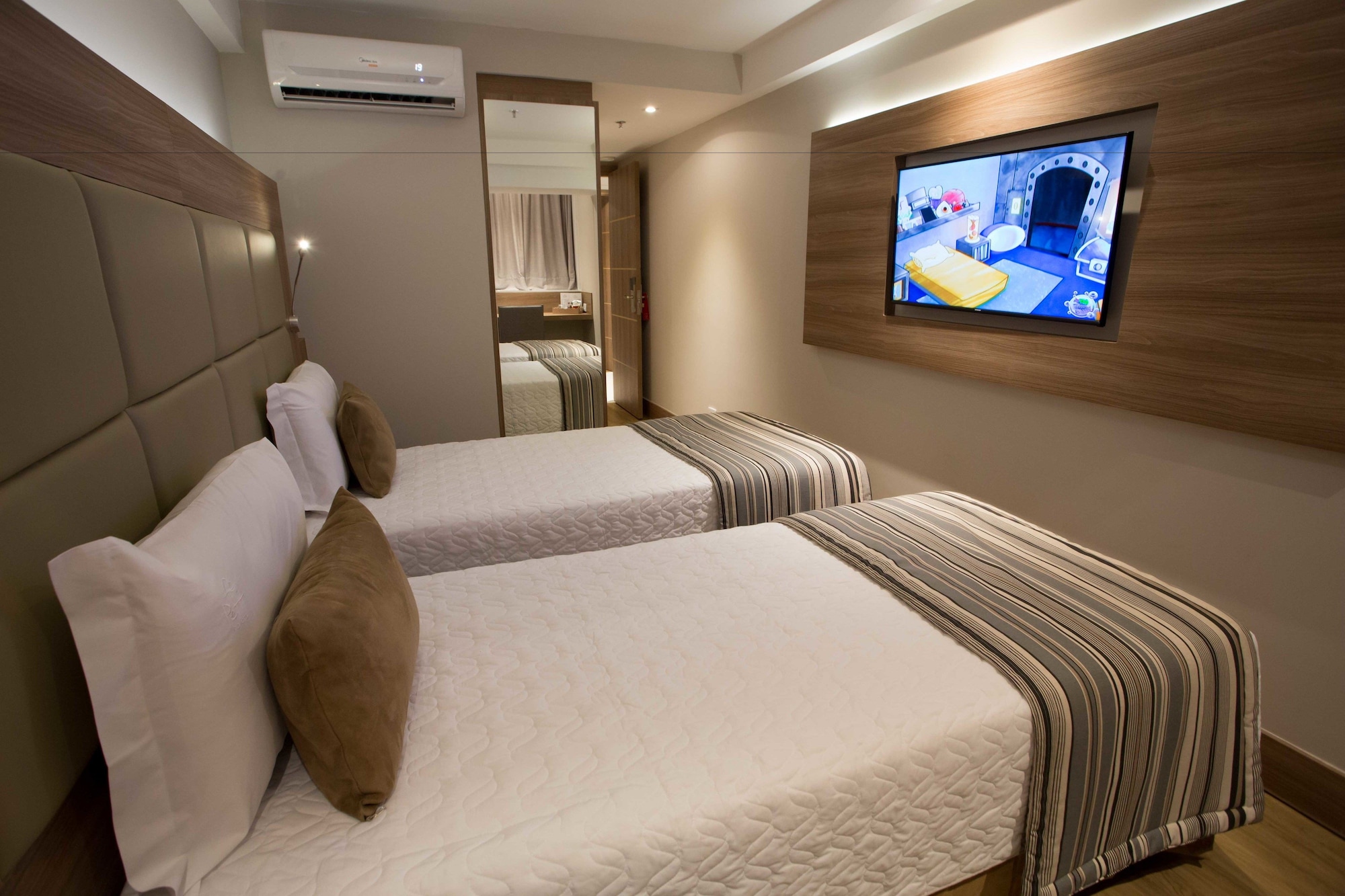 غرفة قياسية بسريرين منفصلين، Petit Rio Hotel 2/5