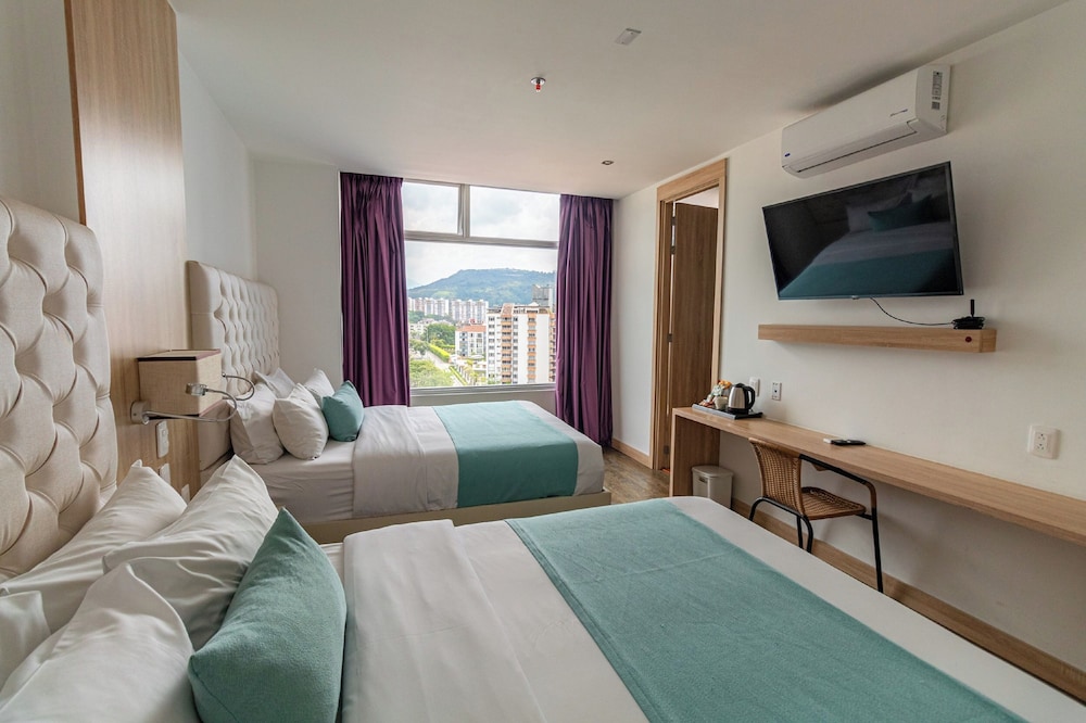 غرفة بسريرين منفصلين، Hotel Roseliere Bucaramanga 3/7
