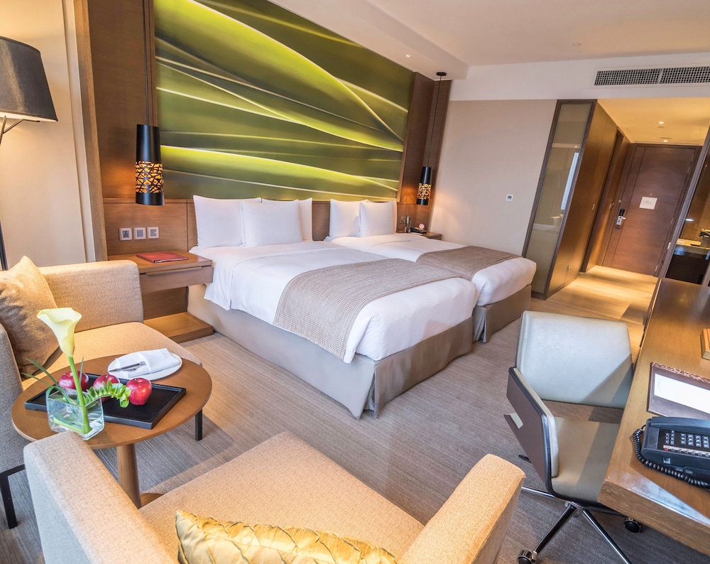 غرفة ديلوكس بسريرين مزدوجين بإطلالة على المدينة، Marco Polo Ortigas Manila 3/5
