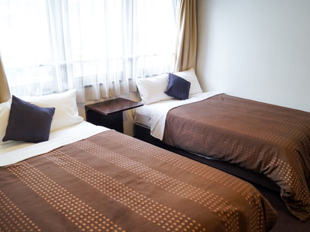 غرفة بسريرين منفصلين، Hotel Livemax Budget Umeda 2/3