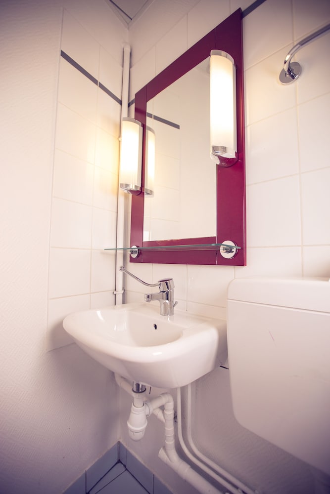 TIMHOTEL LE LOUVRE 51/56