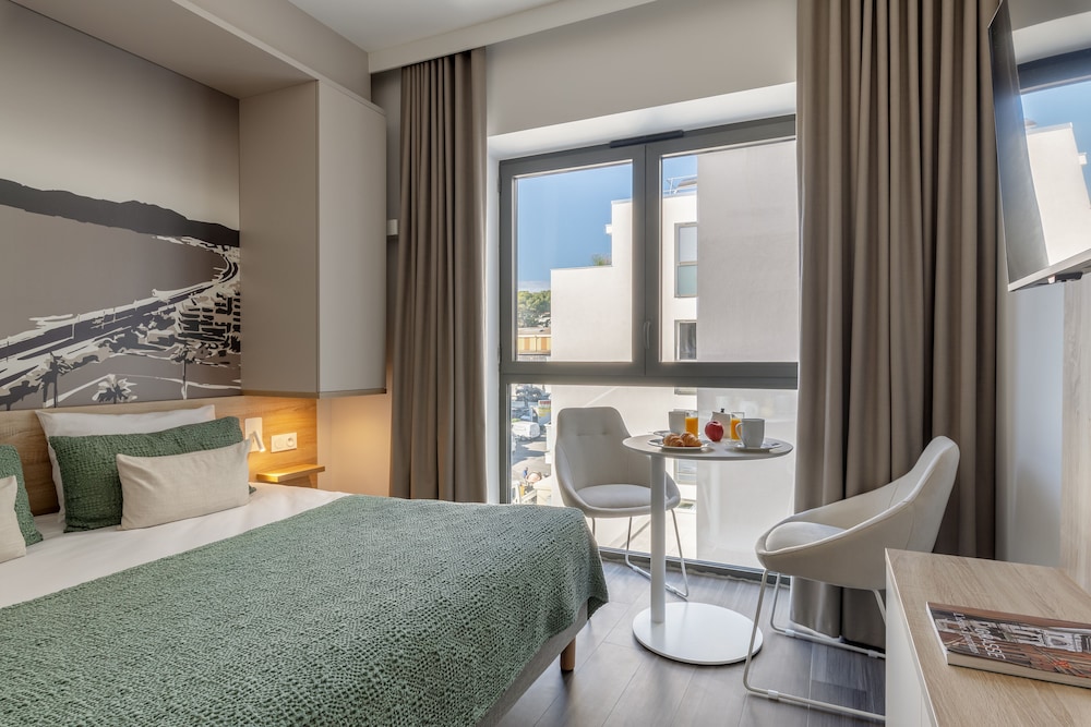 Lagrange Apart Hotel - Les Jardins de l Olympie 12/25
