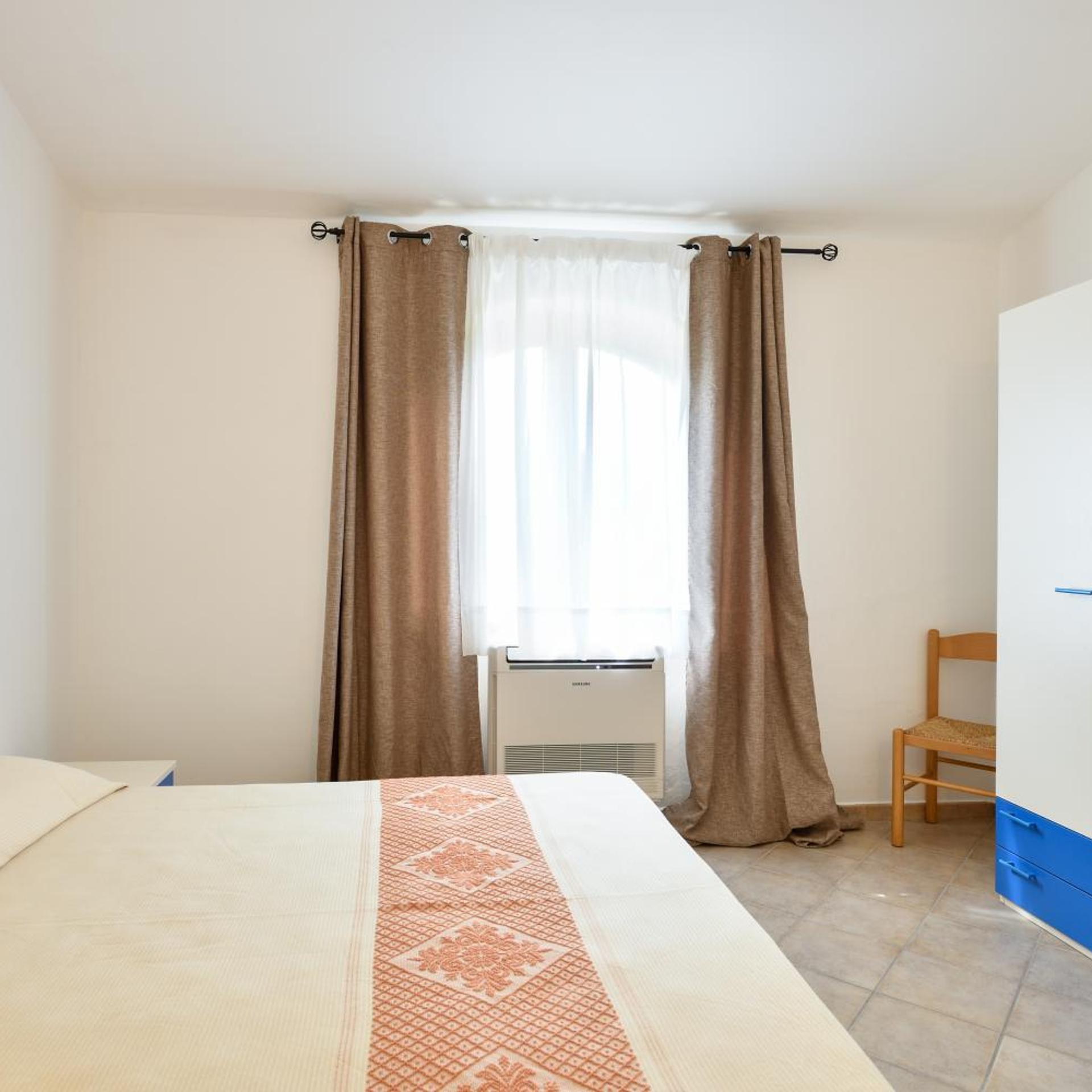 Room at Baia del Porto, BUDONI
