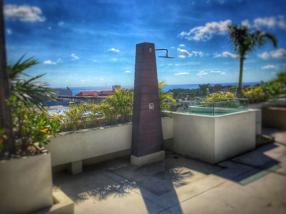 The Palm at Playa 65/77