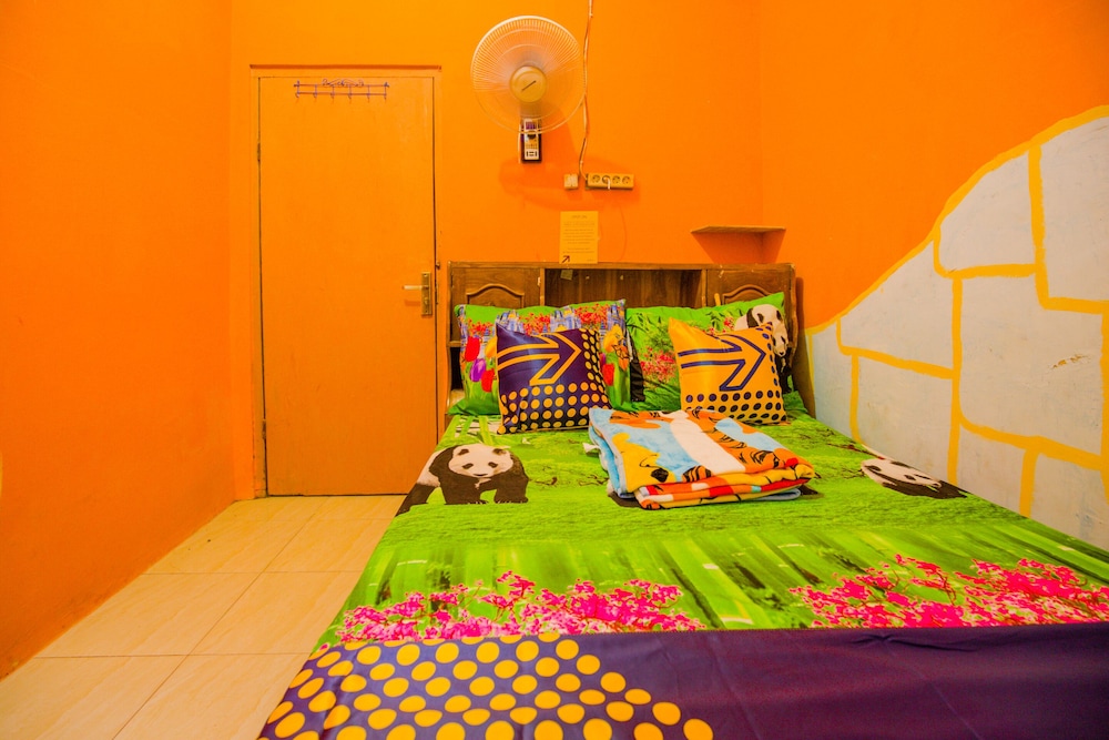 SPOT ON 1762 Gandrung Payungan Family Inn 12/26
