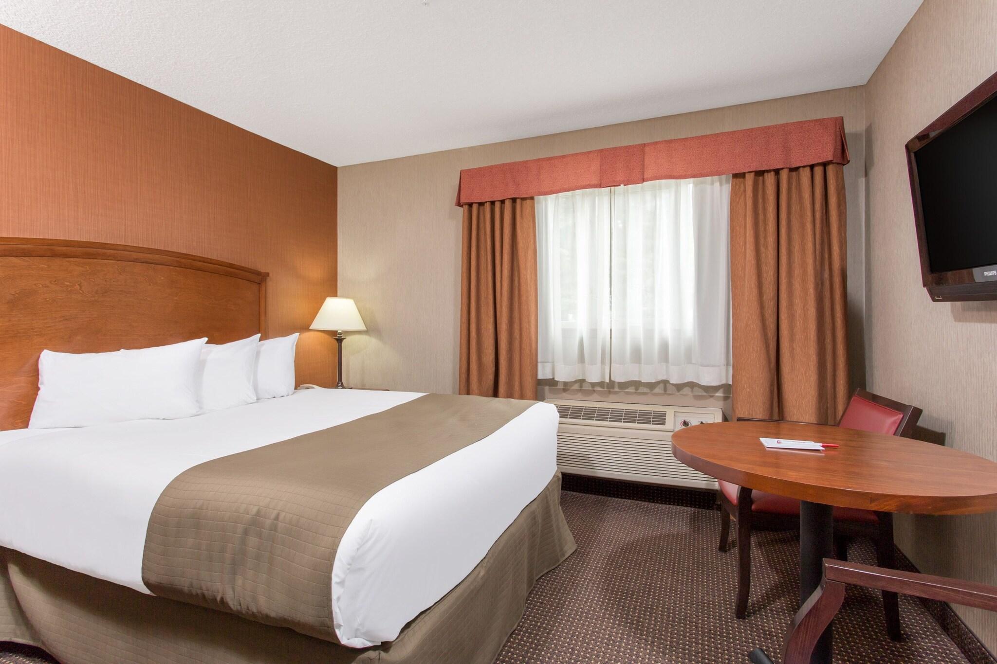 DELUXE, SINGLE, QUEEN BED