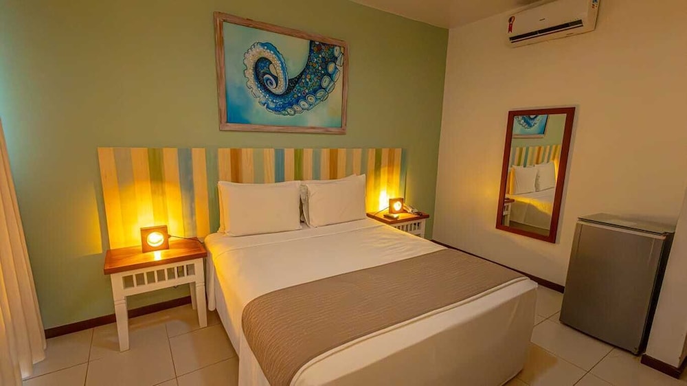 غرفة ديلوكس بسرير كينج بإطلالة على الحديقة، Hotel Enseada Dos Corais 2/3