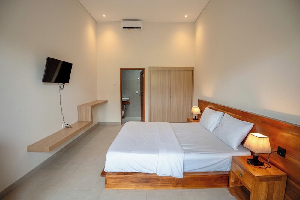 غرفة ديلوكس بسرير كوين، Abimanyu Guest House 3/8