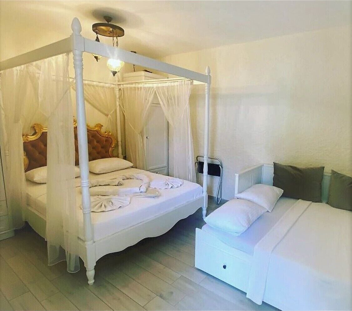 غرفة رباعية بسرير مزدوج مع أريكة، Alacati Grand Eldoris Otel 3/9