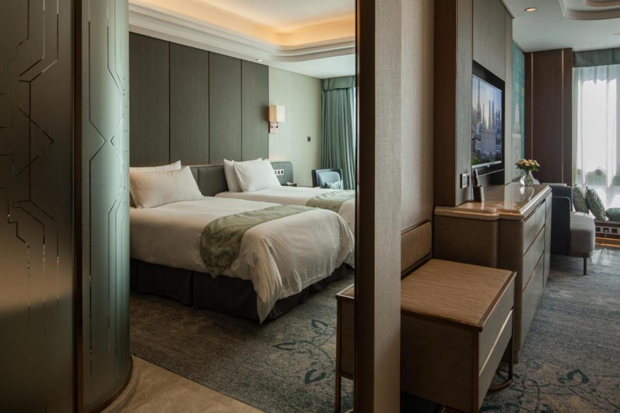غرفة سوبيريور بسريرين منفصلين بإطلالة على الحديقة، Oriental Riverside Hotel Shanghai International Convention Center 5/5