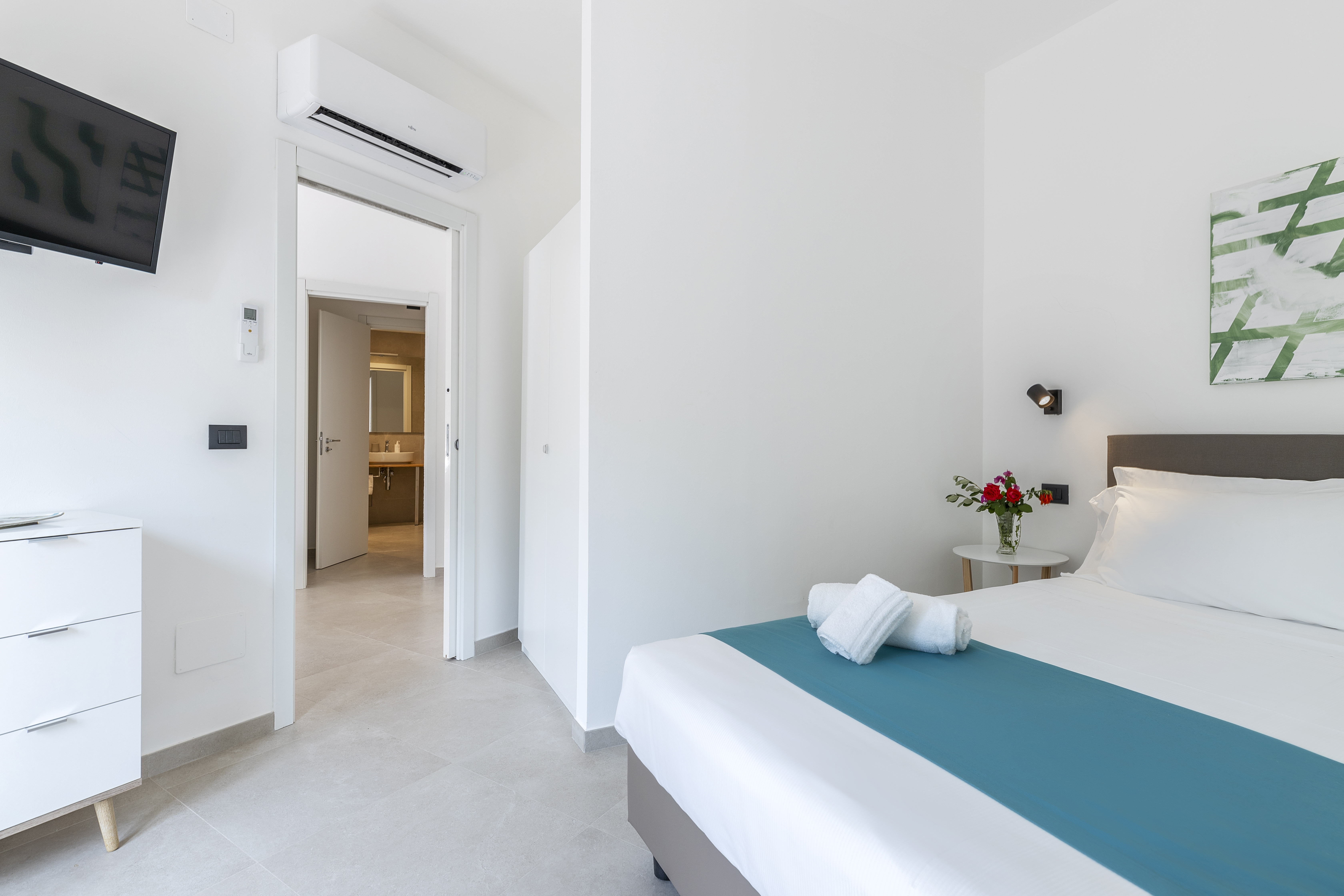 غرفة بأربعة أسرّة بإطلالة على الحديقة بشرفة بغرفتين، Residence Villa Giardini 2/5