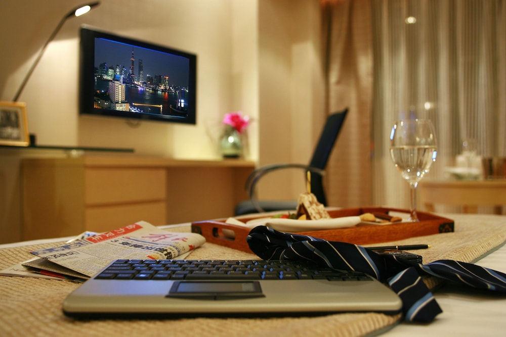 Jin Jiang Tower Hotel 57/63