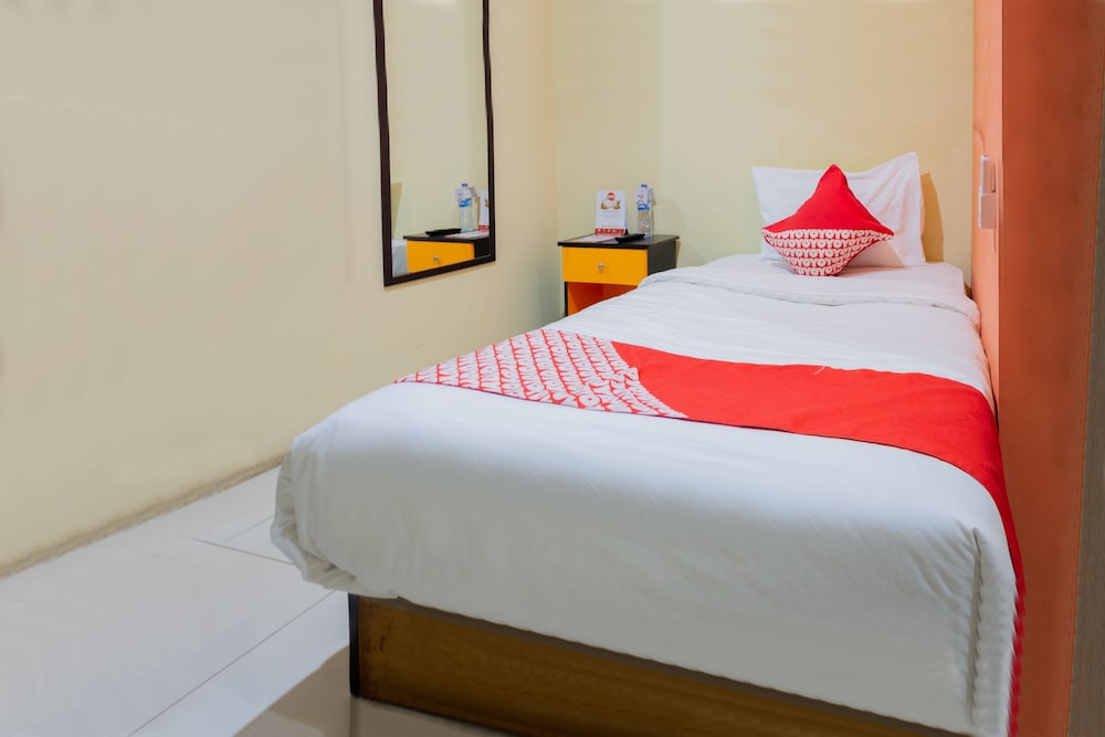 Oyo 989 Audah Guesthouse Syariah 12/36