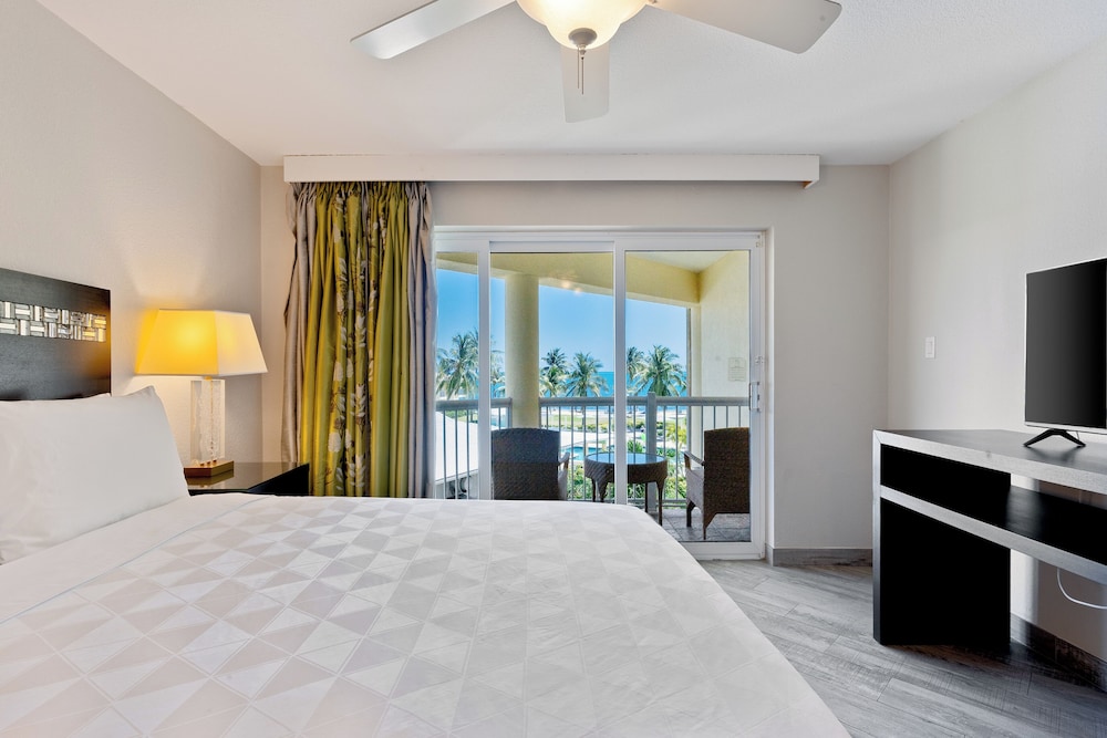 1 Bedroom King Suite Ocean View - Plus Sleeper Sofa، The Grand Caymanian Resort 4/9