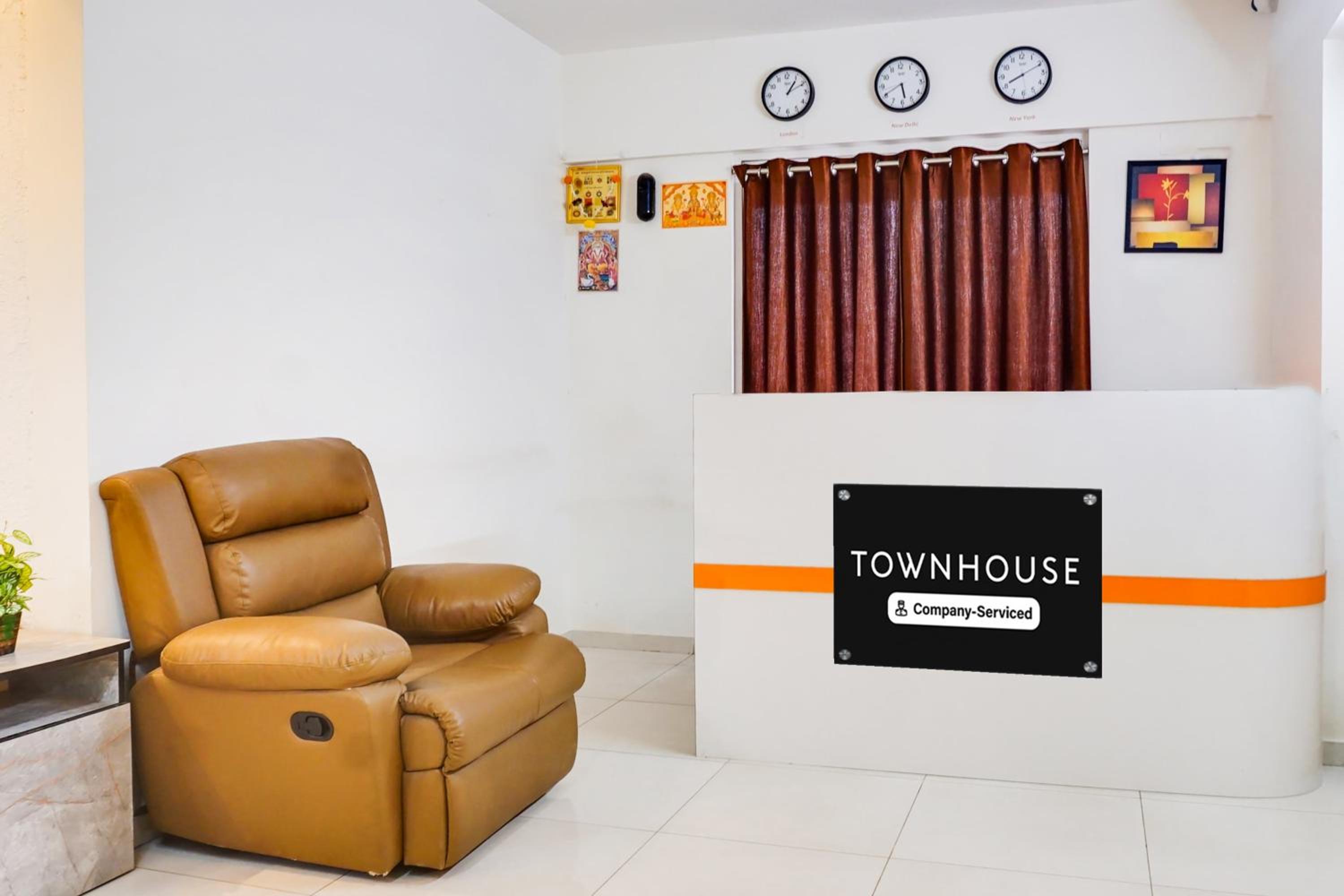 Super Townhouse Lohegaon Near Pune Airport formerly Landmark Regency 27/29