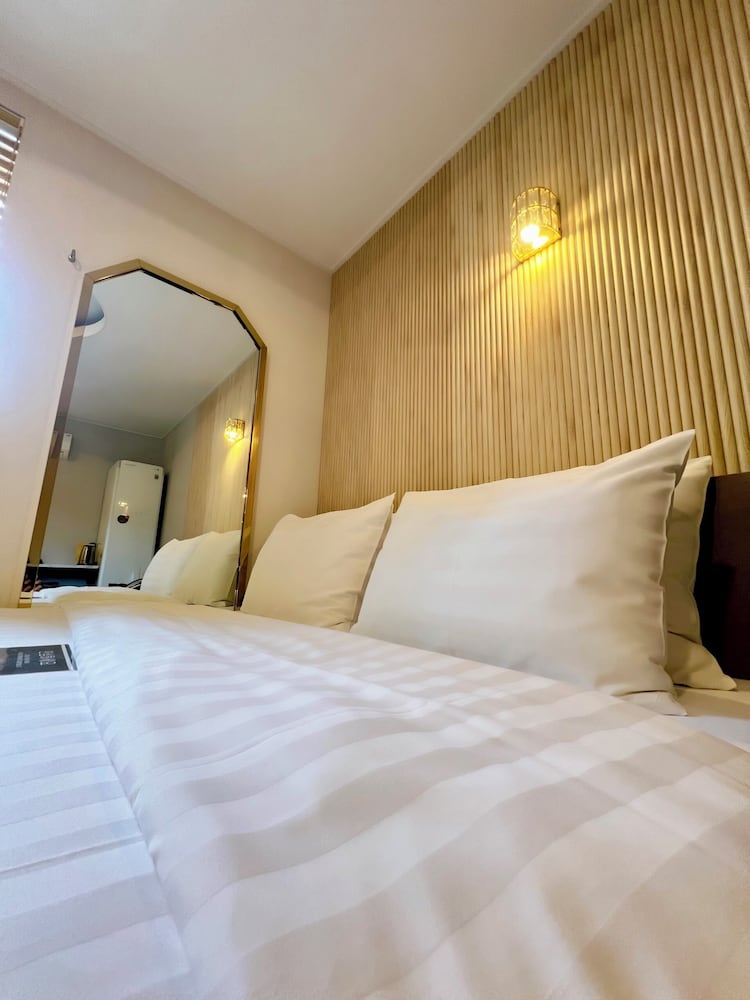 غرفة ملكية بسرير مزدوج وسرير فردي، Hotel 24st Urban Brown Seosan Lake Park 4/8