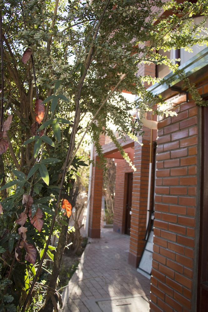 Qhini Hotel Boutique 56/59