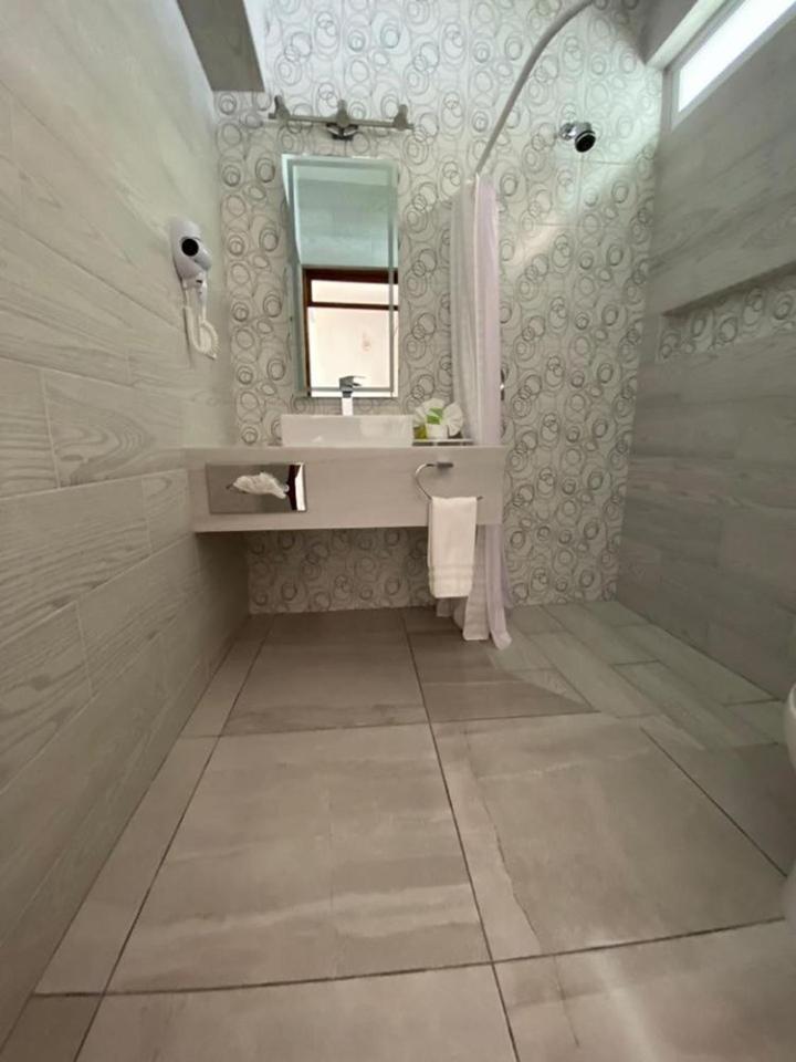 غرفة ديلوكس بسريرين منفصلين، Hotel Quinta las Flores 4/4