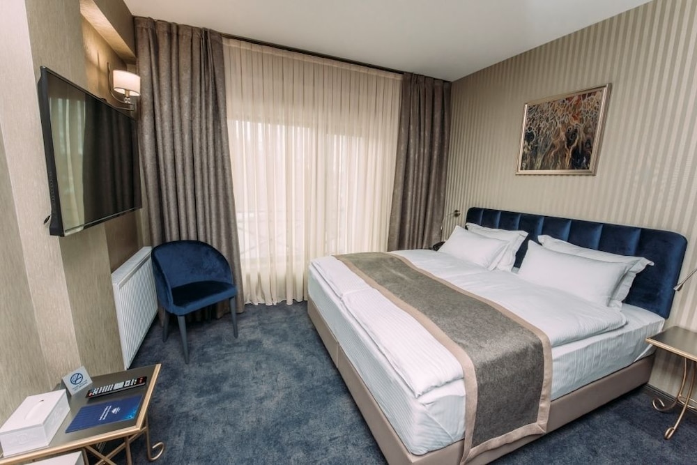 جناح عائلي بسريرين كينج بشرفة بغرفتي نوم، Hotel Sapphire Bakuriani 2/3