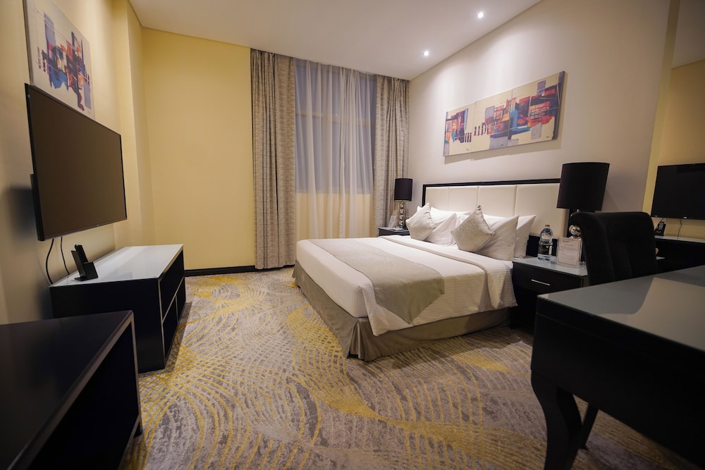 Deluxe, Suite, King Bed, 2 Bathrooms، Grand Villaggio Hotel Abu Dhabi 3/5